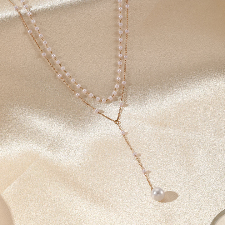 Grace in Layers – Pearl Double Layer Twin Pearl Necklace
