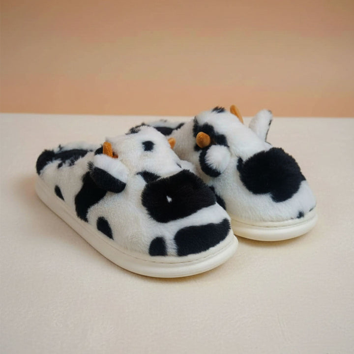 Moo-ve Into Comfort with Cozy Cow Slippers!