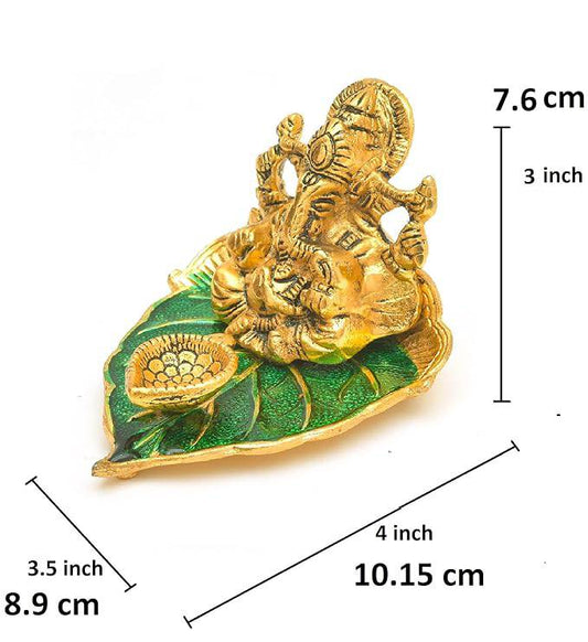 Elite Brass Metal Ganesh Ji Sitting on The Green Leave with Diya Deepak , Golden Decorative Showpiece - 9 cm  (Brass, Gold) - All Inclusive Family Treasures