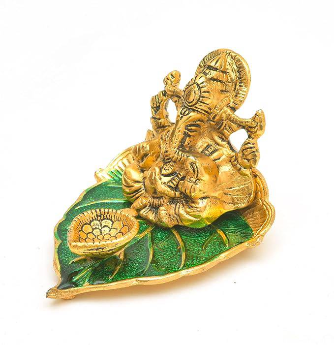 Elite Brass Metal Ganesh Ji Sitting on The Green Leave with Diya Deepak , Golden Decorative Showpiece - 9 cm  (Brass, Gold) - All Inclusive Family Treasures