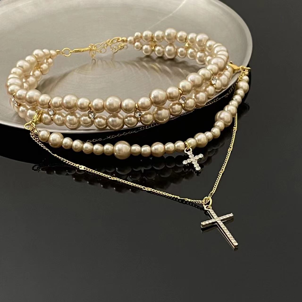 Timeless Elegance: The Multi-Layer Pearl Cross Necklace